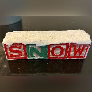 Upcycled toy blocks spell out SNOW! Holiday decor